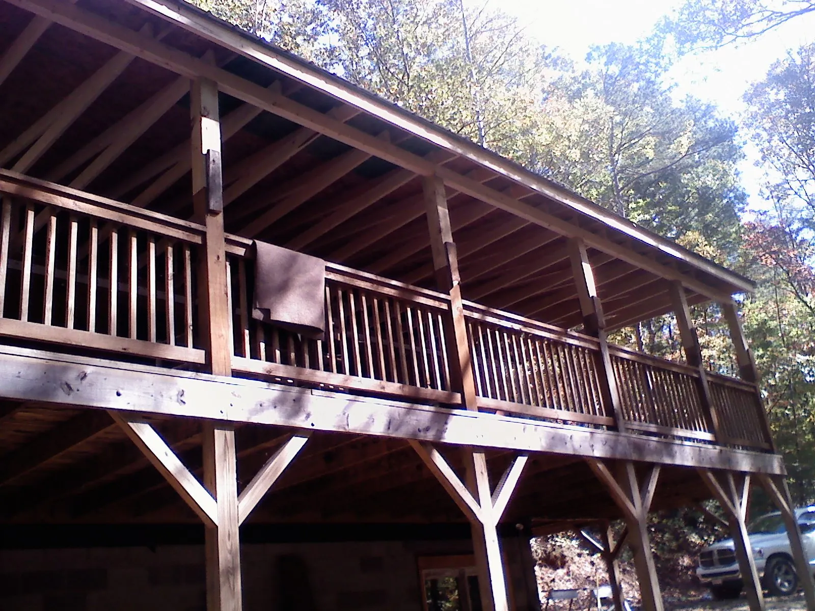 Timber framing under a new elevated porch and deck — Roof Leak Repair in East Marion by Roofing Brothers